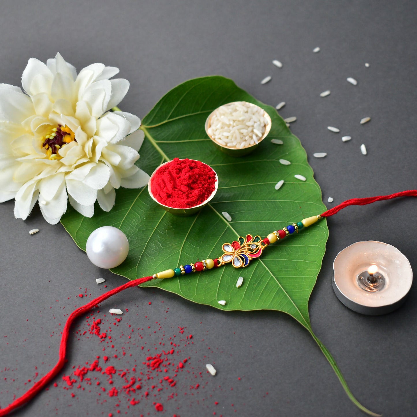 Colorful Peacock Feather Design Rakhi With Beaded Thread