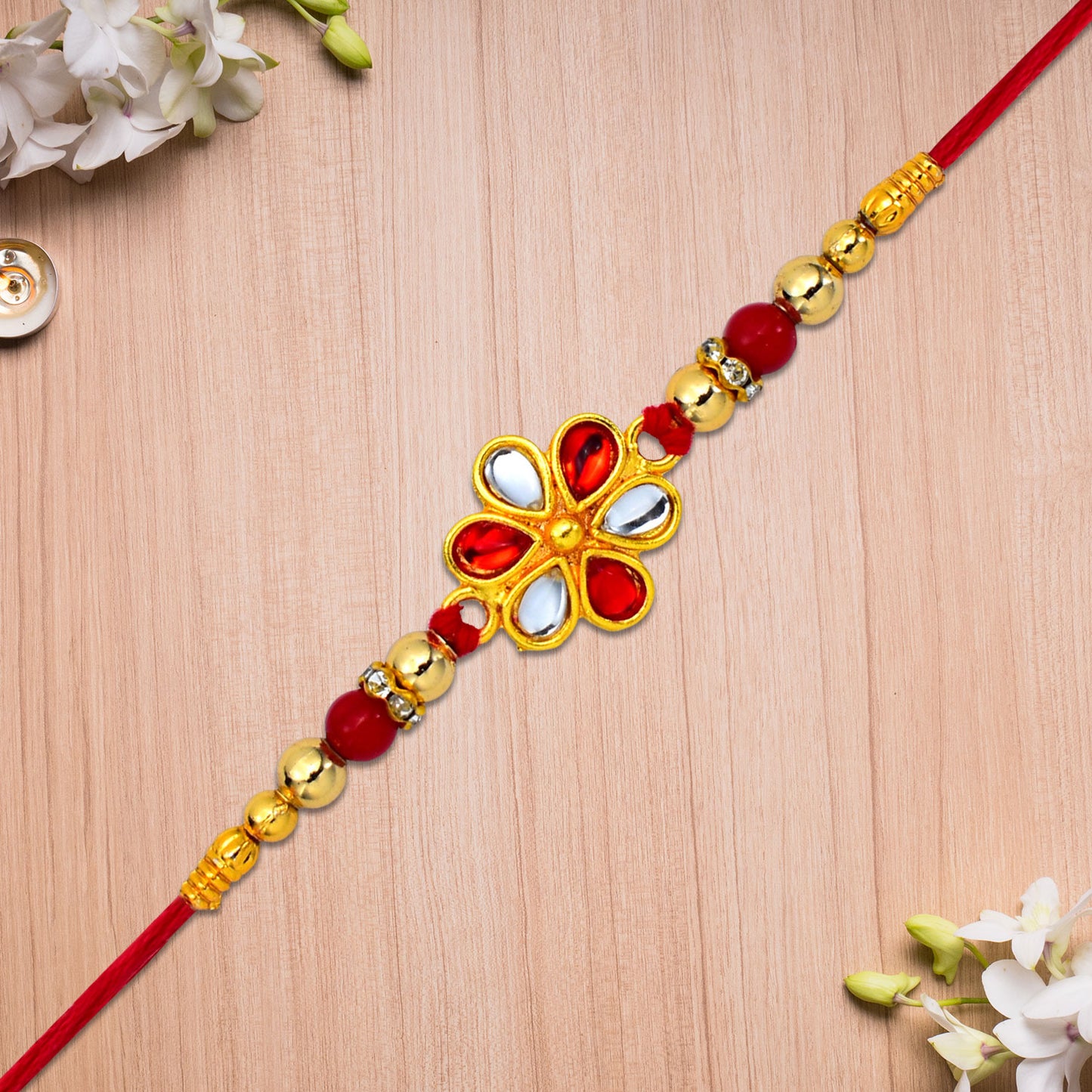Elegant Red White Beaded Rakhi With Teardrop Kundan Floral Centerpiece