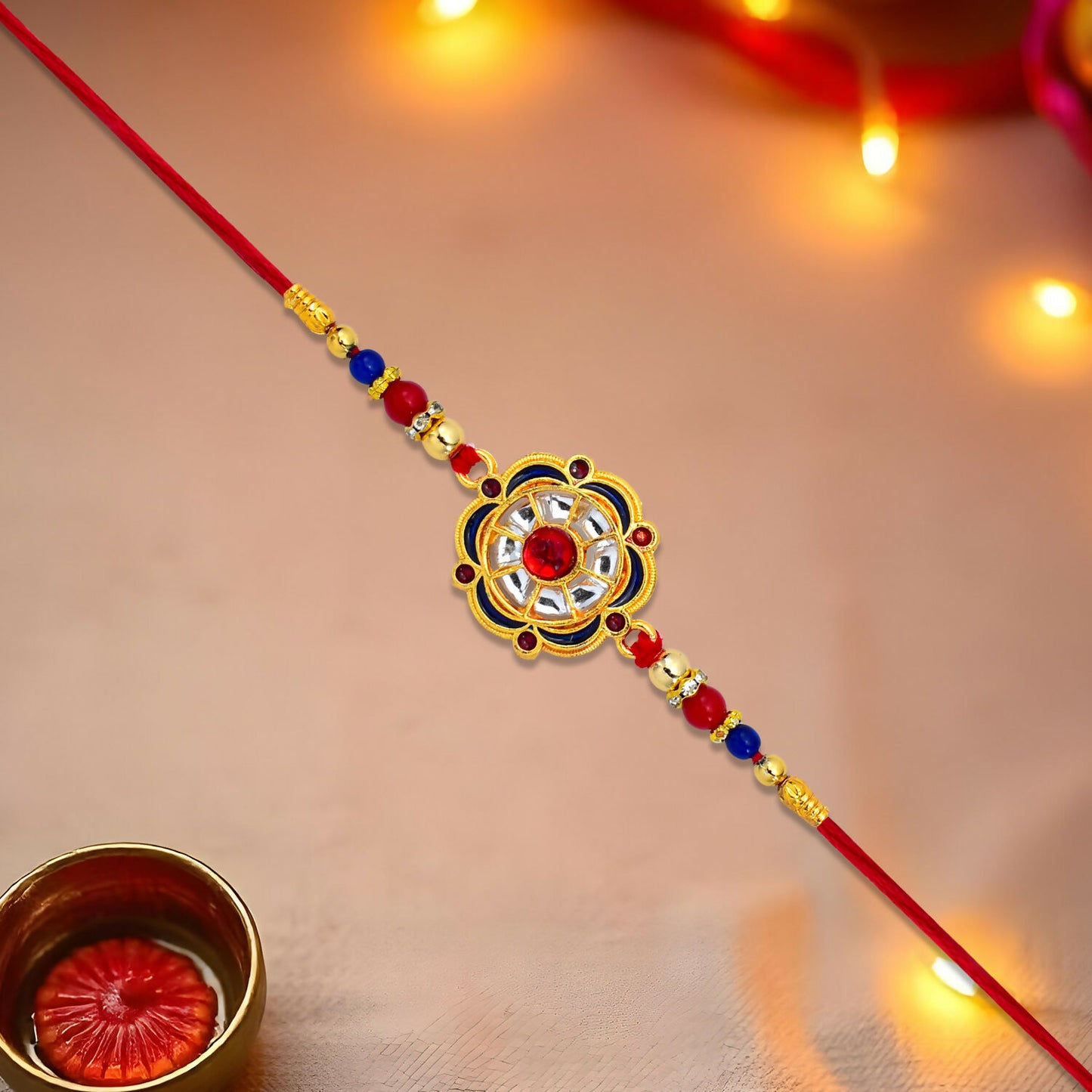 Traditional Kundan Rakhi With Floral Design And Beaded Detailing