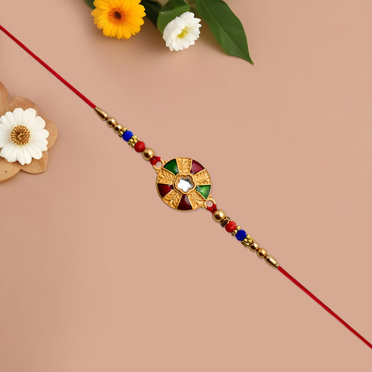 Elegant Multicolor Kundan Rakhi With Golden Floral Round Dial And Beaded Red Thread
