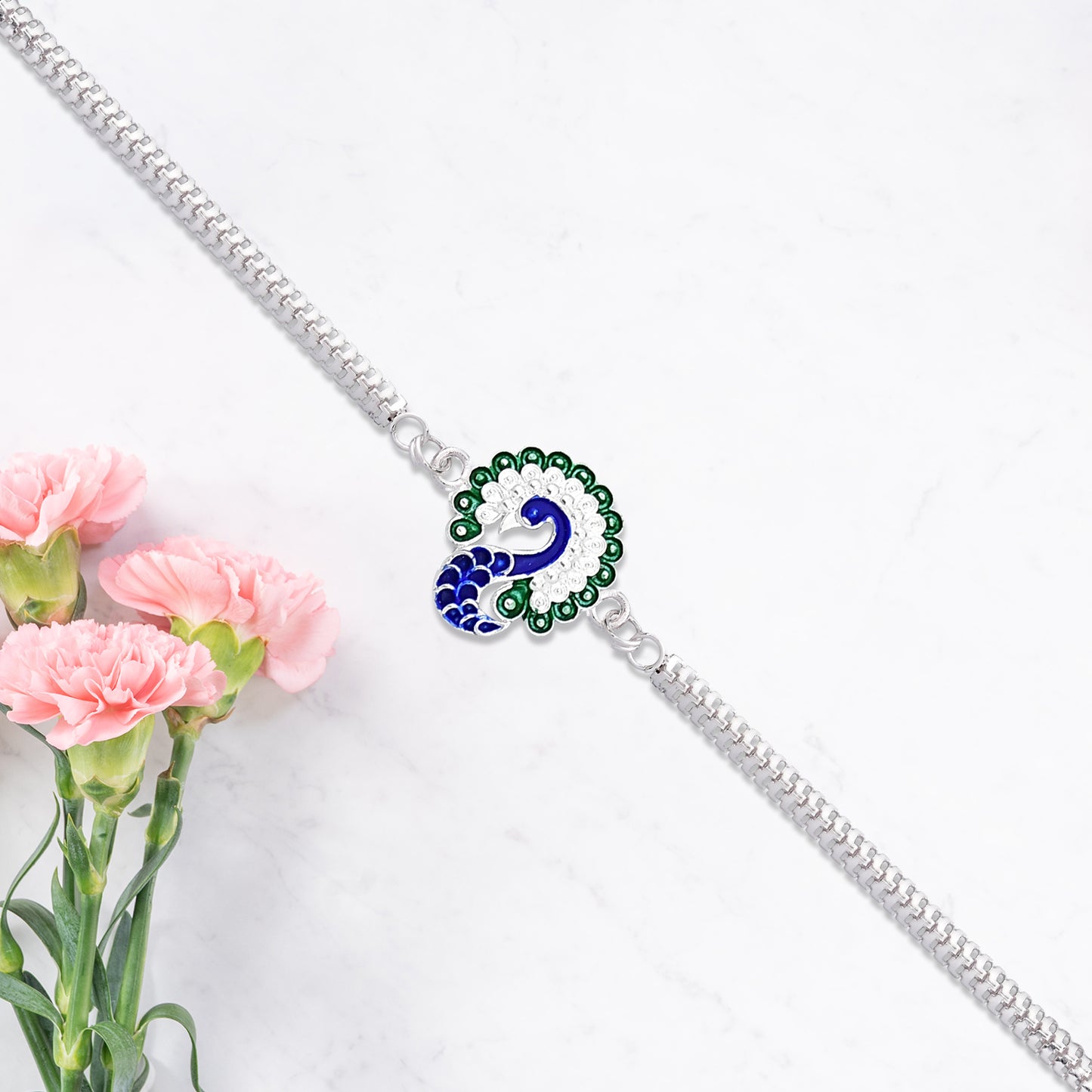 Peacock Design Metal Chain Rakhi With Blue Green And White Stone Work